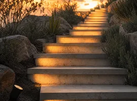 Escalera iluminada progresivamente, símbolo de la captación continua frente a acciones puntuales